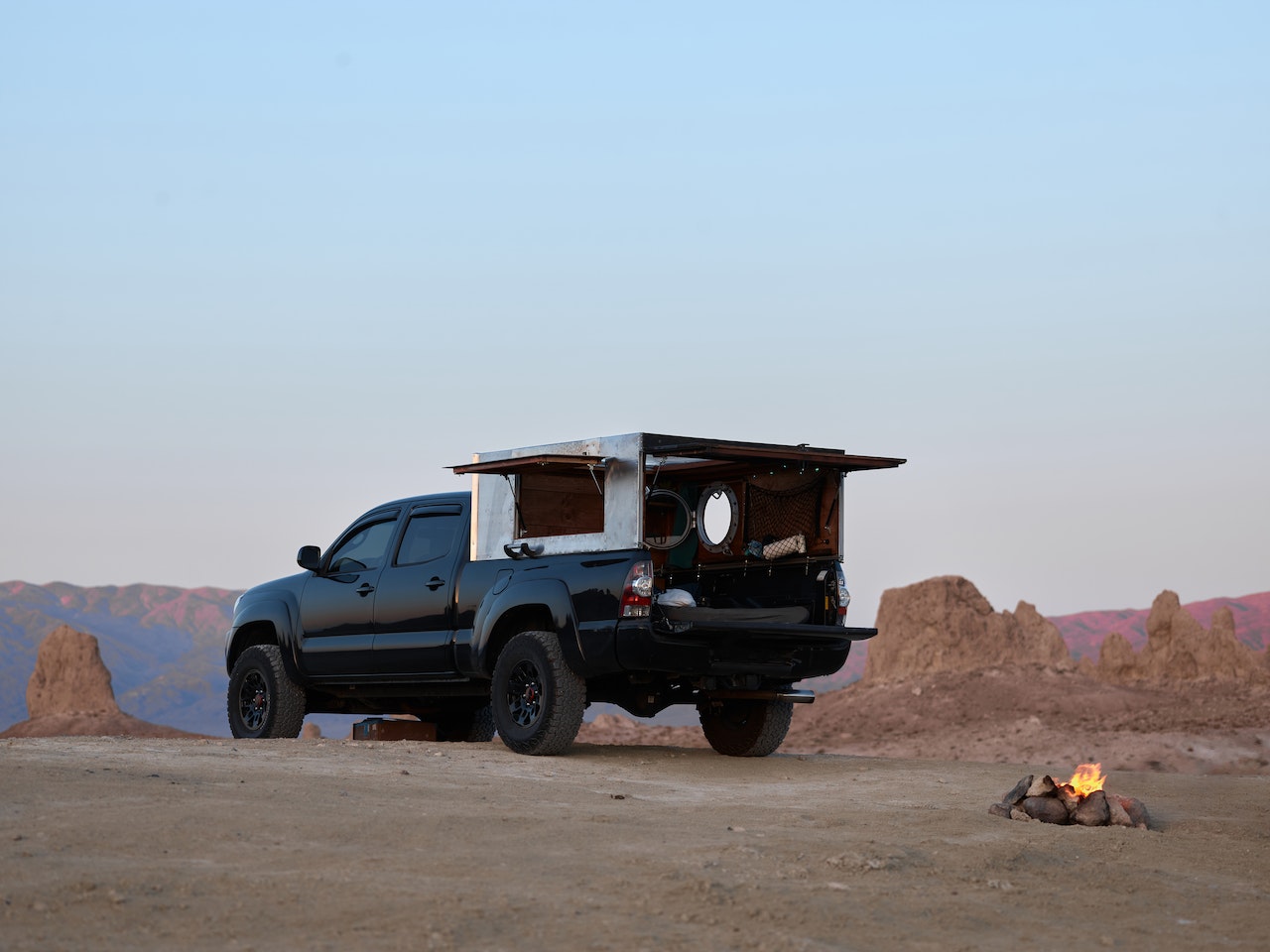 Camper Pickup on Brown Sand | Veteran Car Donations