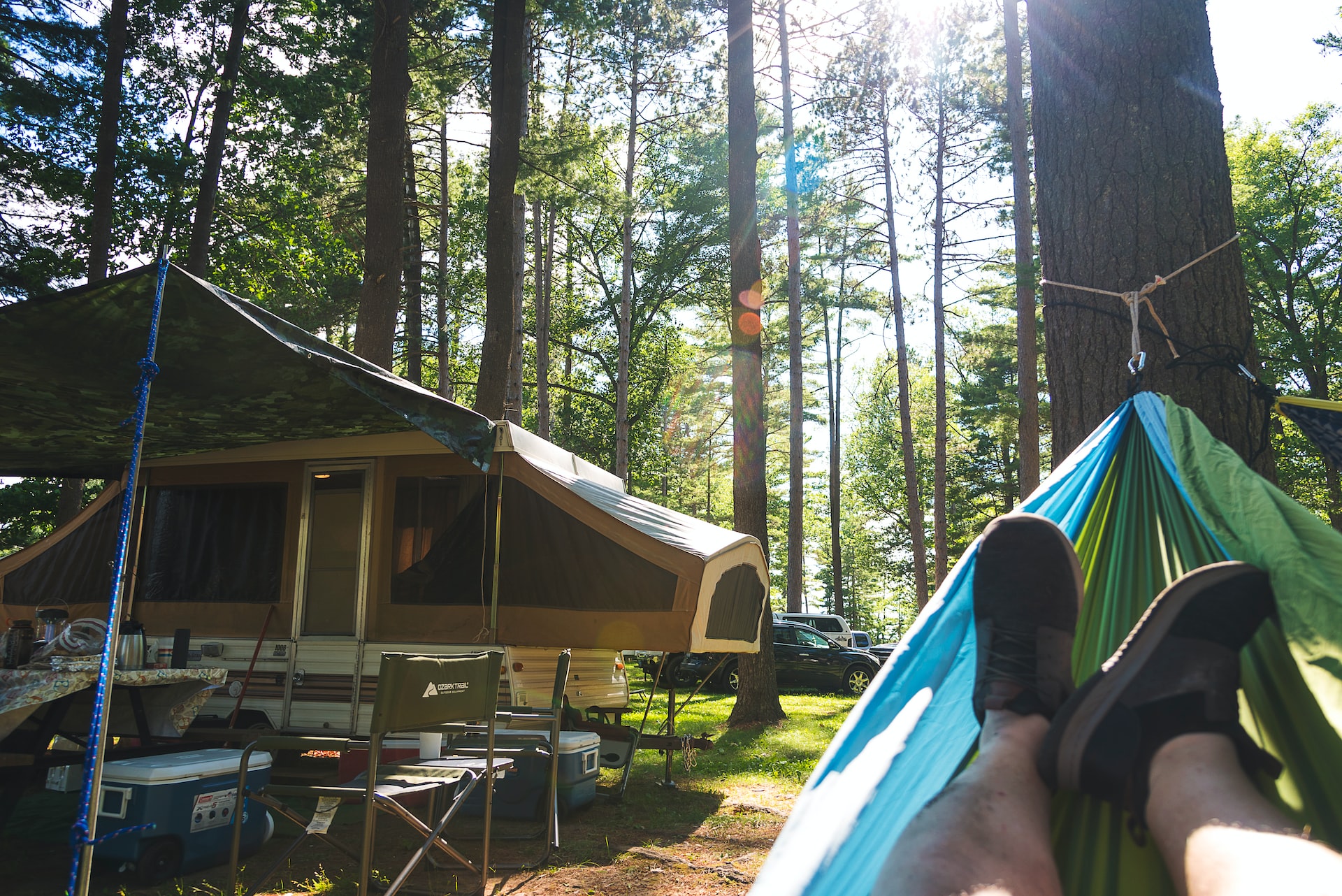 Pop up camper on a forest | Veteran Car Donations