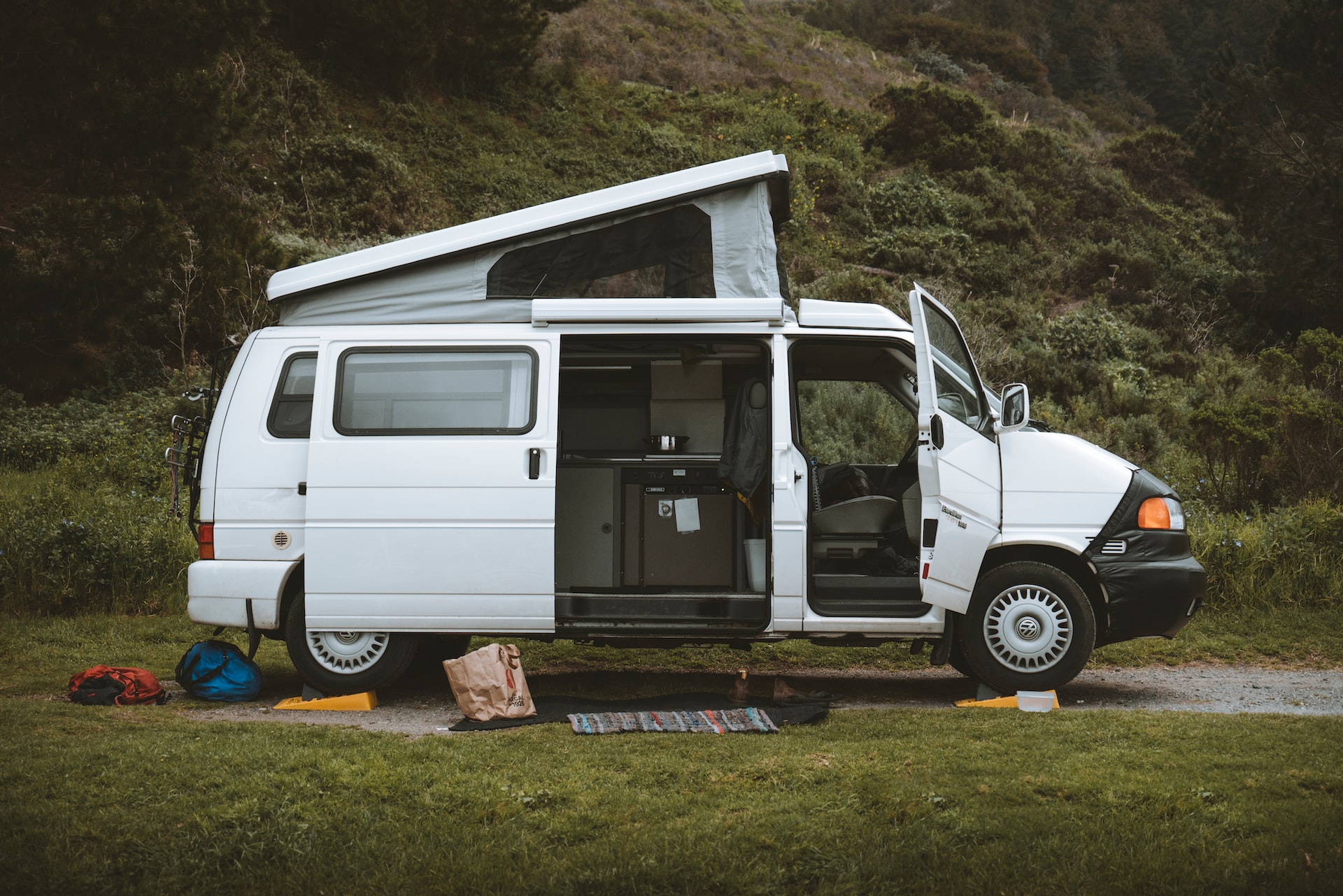 White Van parked with open doors | Veteran Car Donations