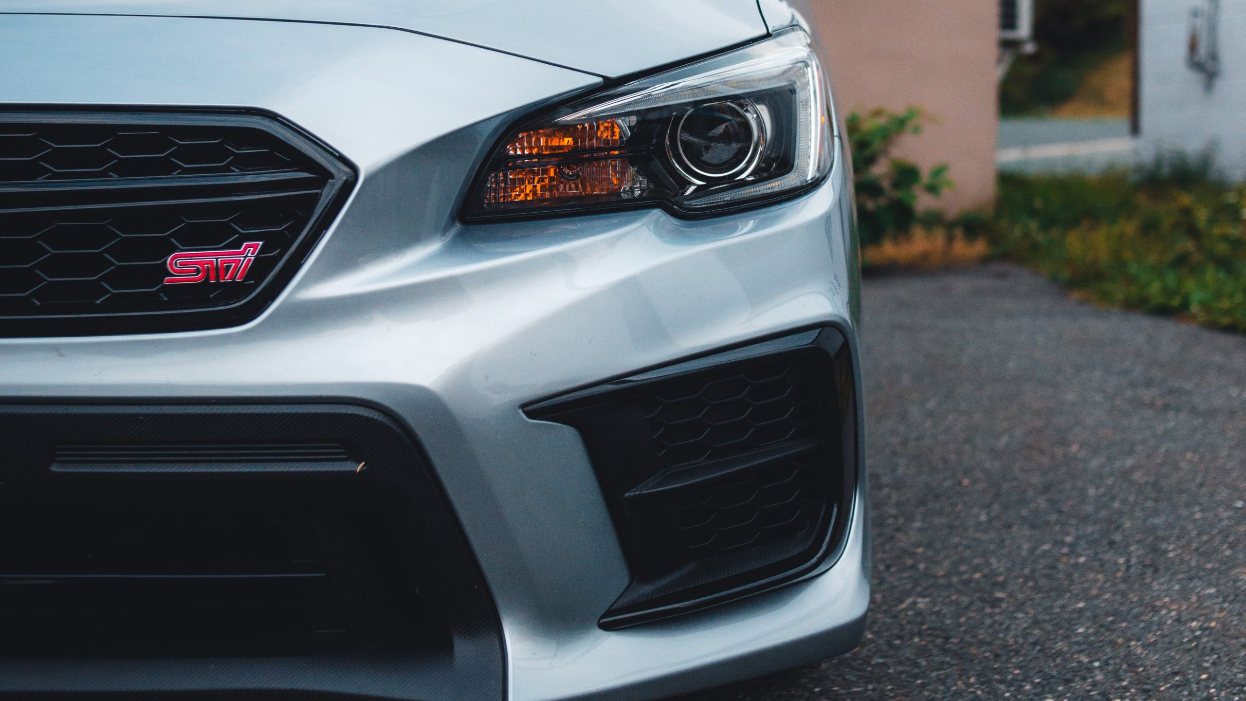 Headlight of a Silver Subaru Car | Veteran Car Donations