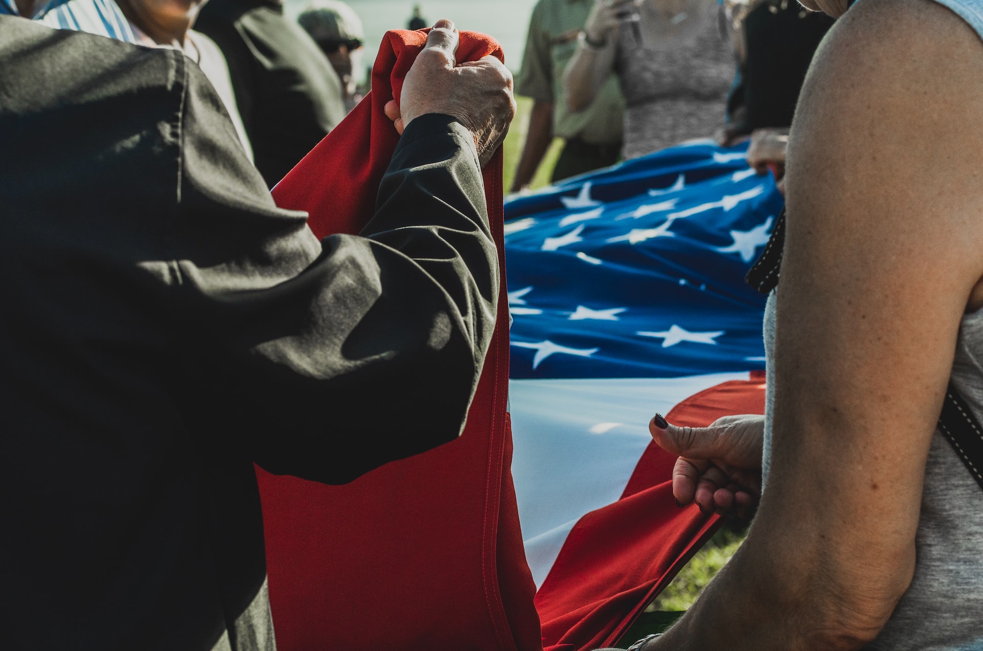 Every day at sunset, the Fort Sumter flag is lowered and folded by park visitors | Veteran Car Donations
