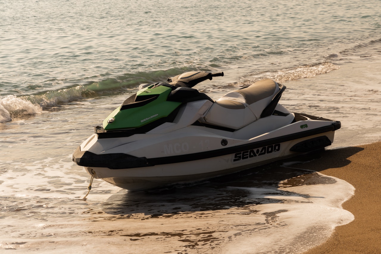 Jetski parked on sand | Veteran Car Donations