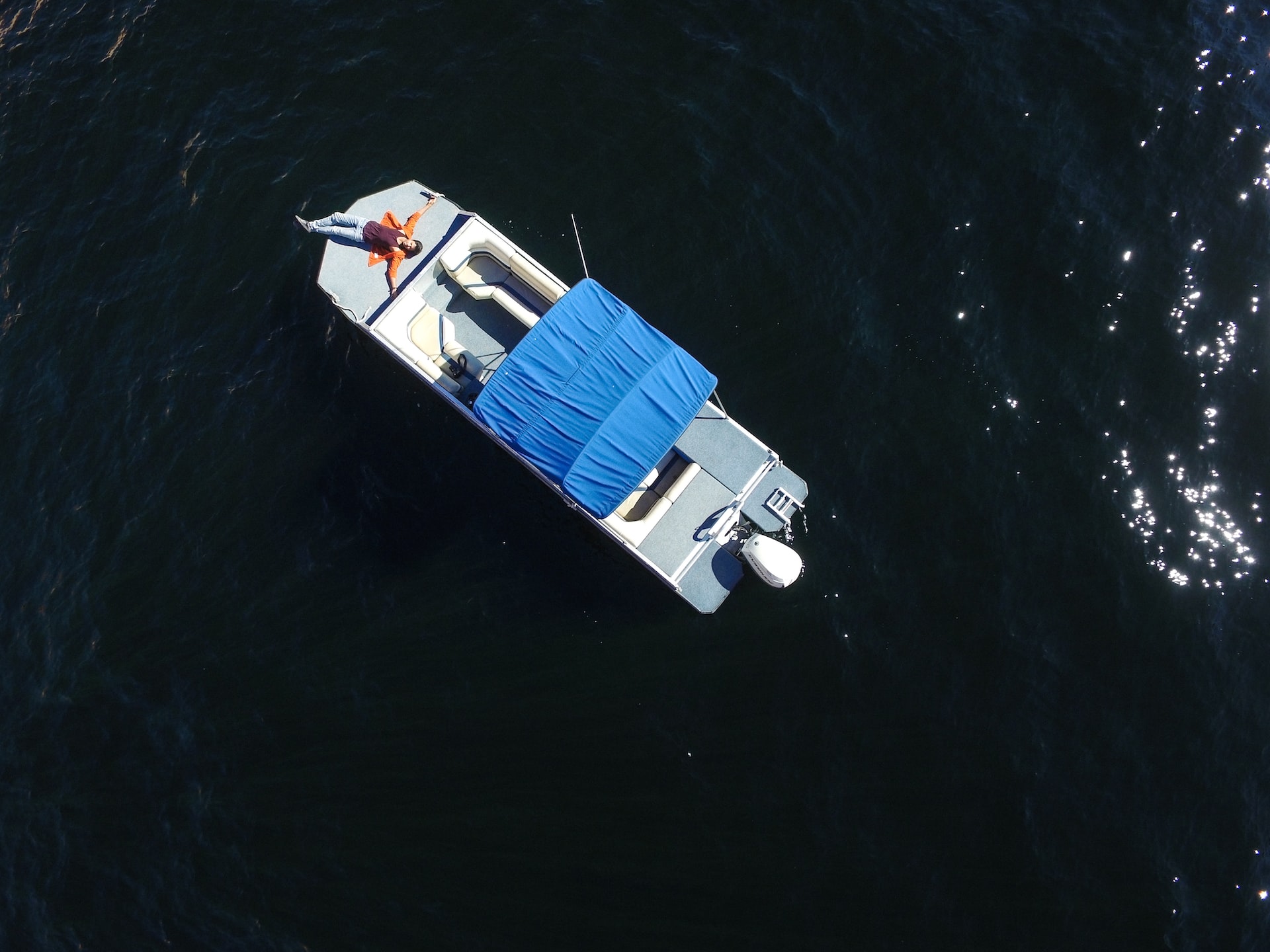 aerial photo of gray boat on body of water photo | Veteran Car Donations