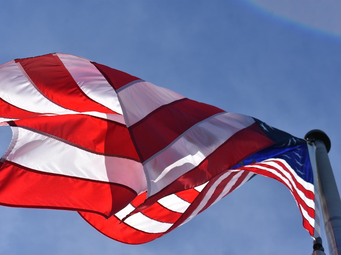 Low Angle Photography of American Flag | Veteran Car Donations