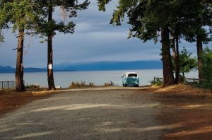 Parked Van Beside a Lake | Veteran Car Donations