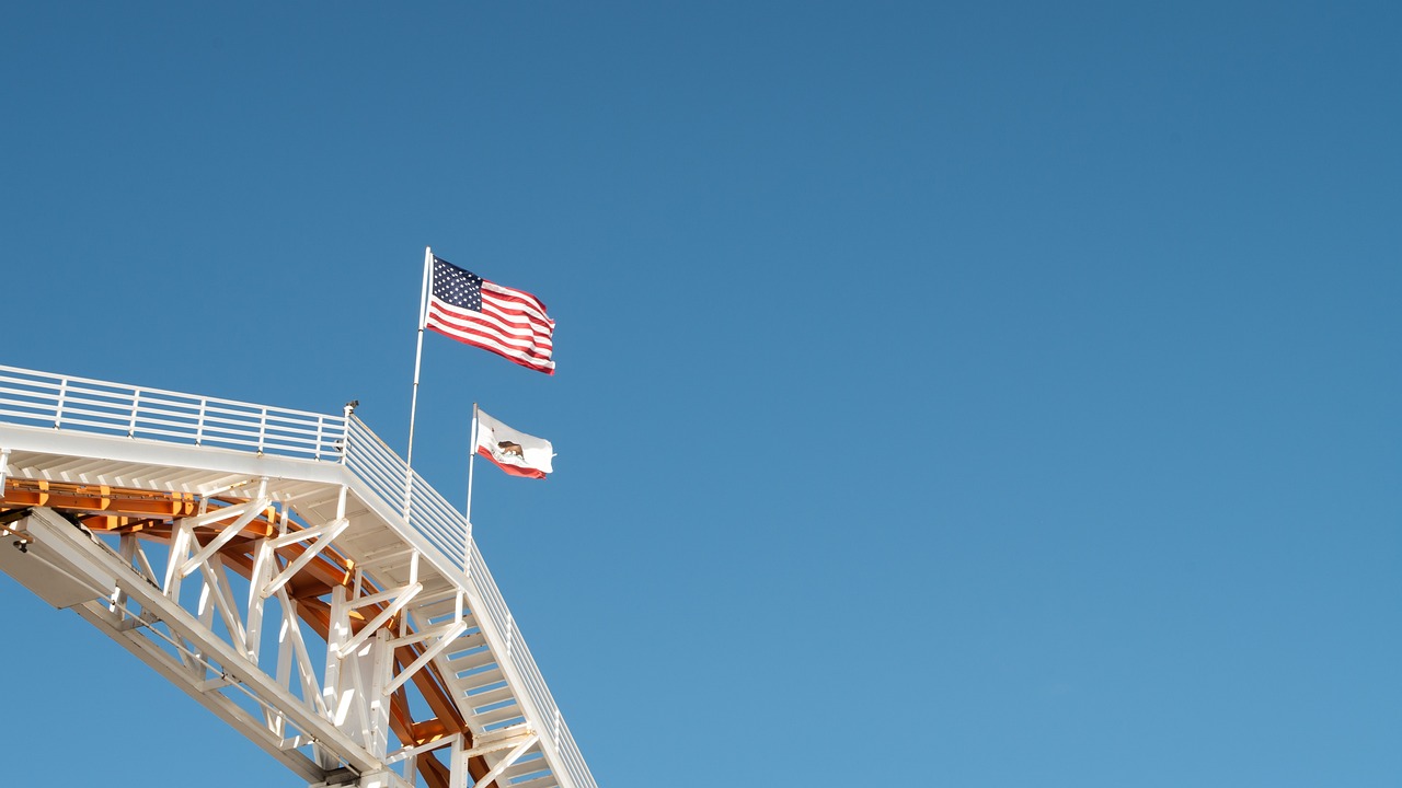 California and US flag at the steel flatform | Veteran Car Donations