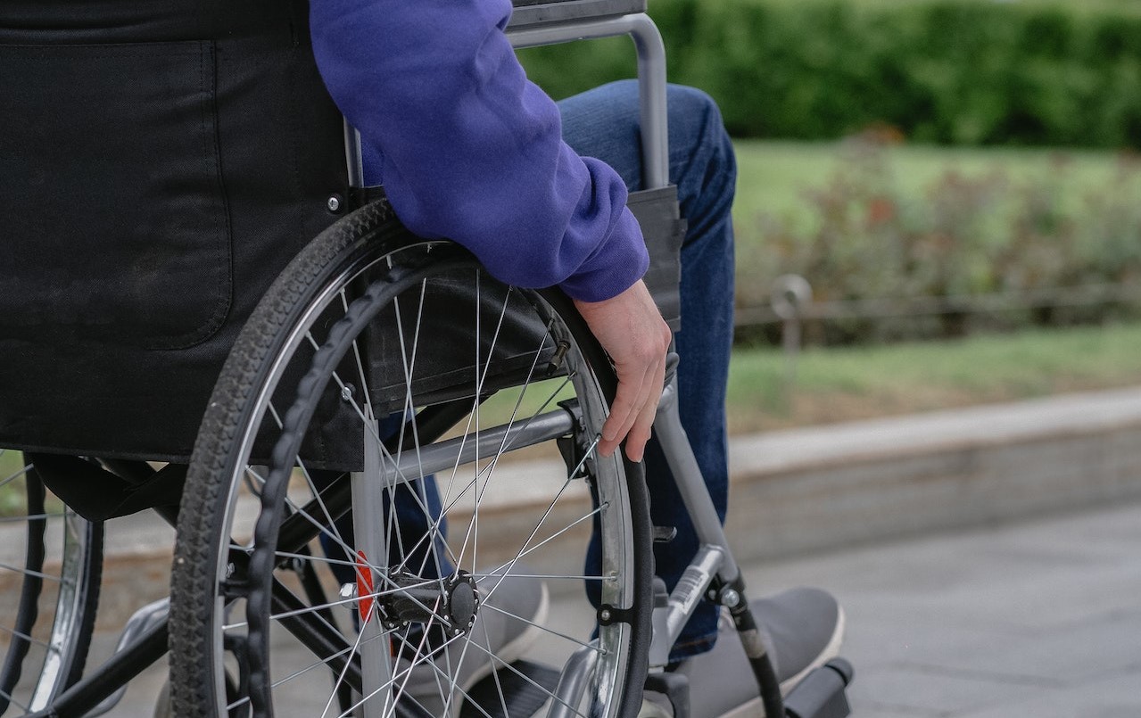 Person Using a Wheelchair | Veteran Car Donations
