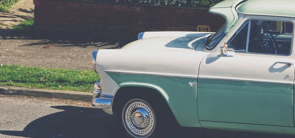 White and Teal Colored Vintage Car in Shirley, Massachusetts | Veteran Car Donations
