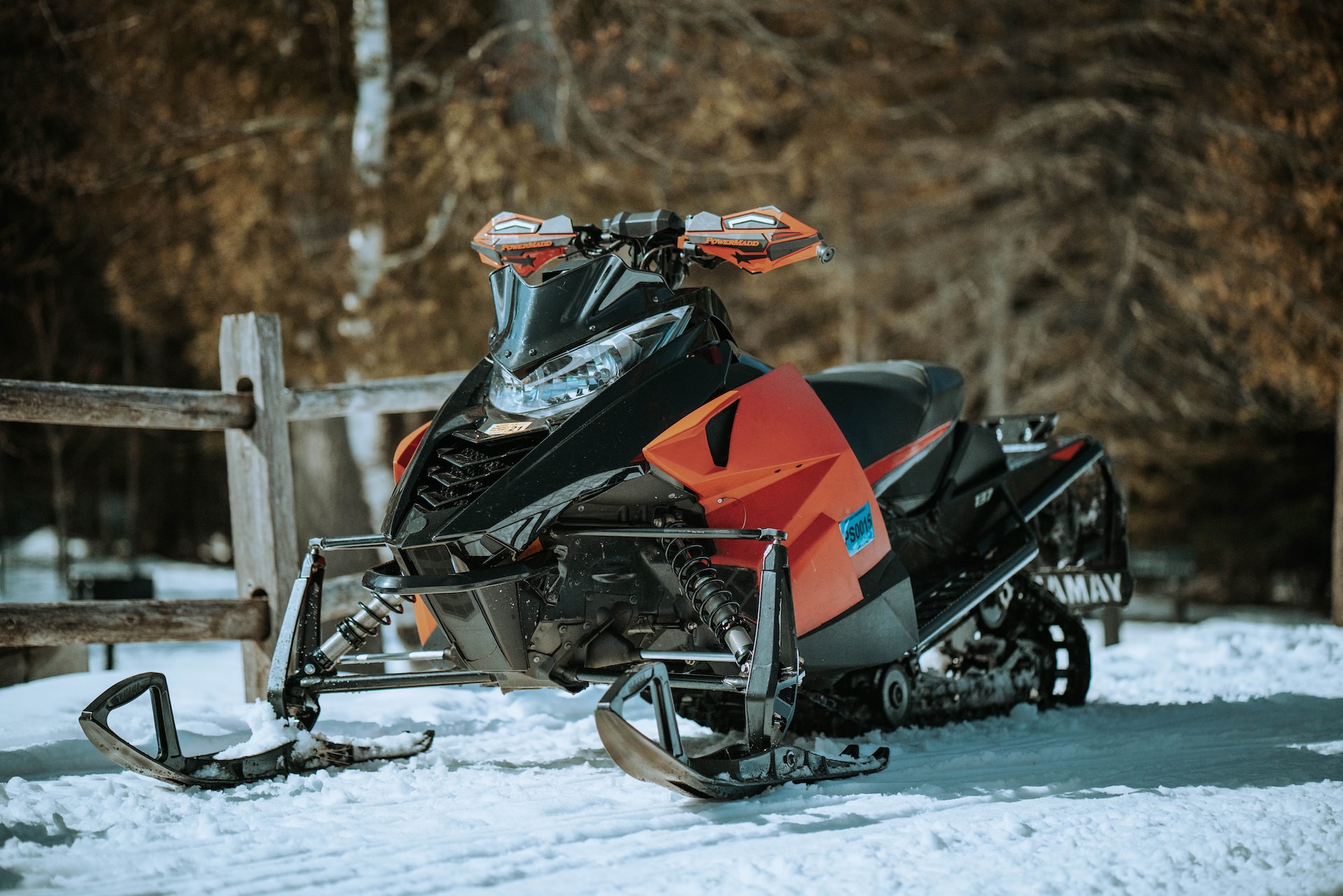 Black and Orange Snowmobile | Veteran Car Donations