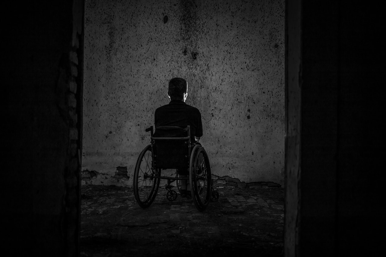 Man Sitting on Wheelchair | Veteran Car Donations
