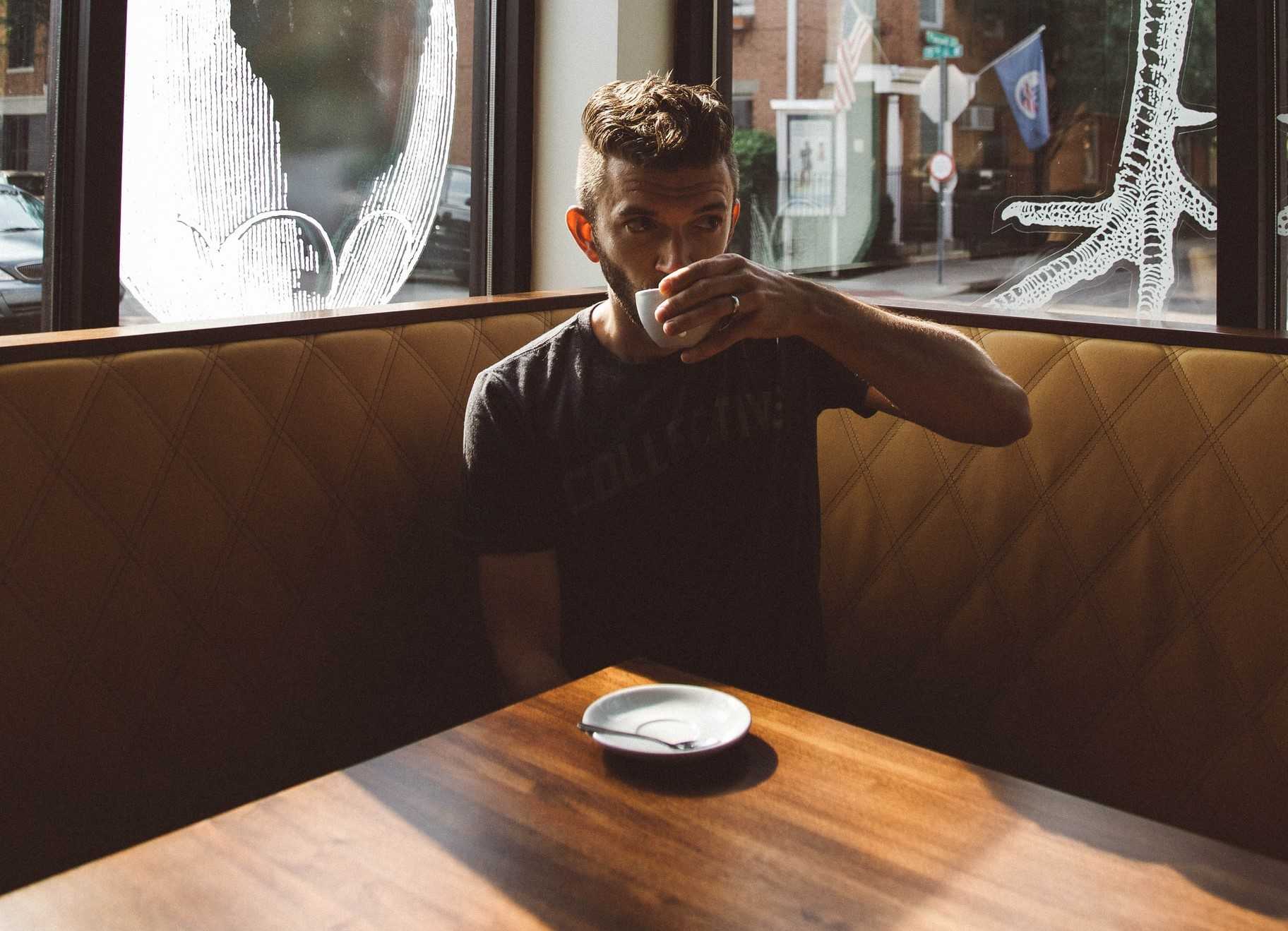 Person Drinking Coffee | Veteran Car Donations