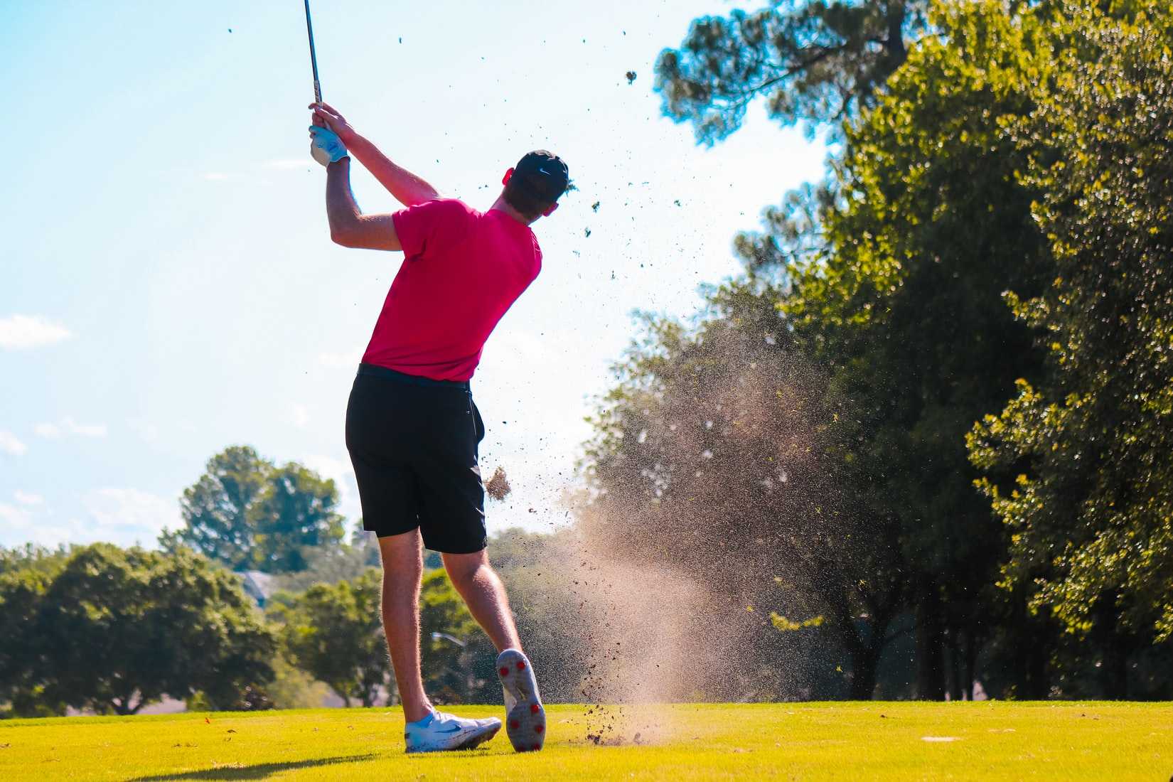 Person Swings Golf Driver | Veteran Car Donations