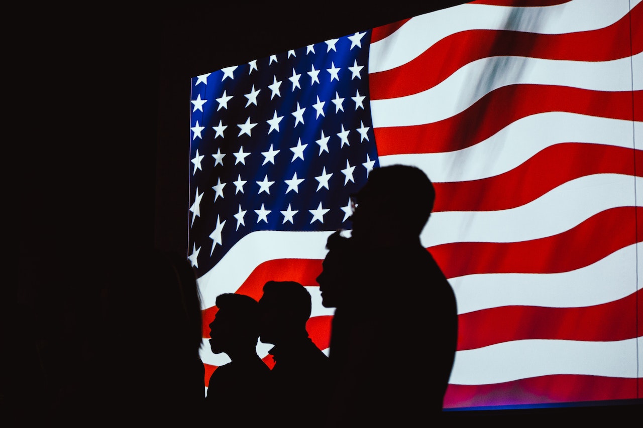 Silhouette of Four Person With Flag of United States Background | Veteran Car Donations