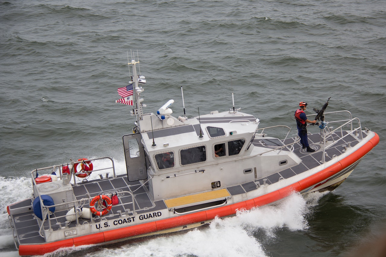 White Orange U.S. Coast Guard Boat on the Sea | Veteran Car Donations