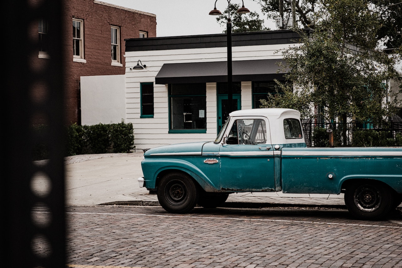 Photo of Blue Classic Pick Up Truck Parked on Roadside | Veteran Car Donations
