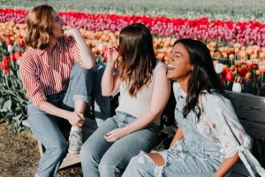 Happy Teens on a Flower field | Veteran Car Donations