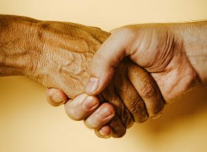 People Shaking Hands | Veteran Car Donations