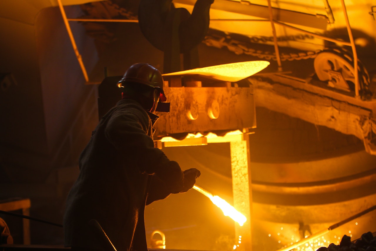 Man Working with Metal | Veteran Car Donations
