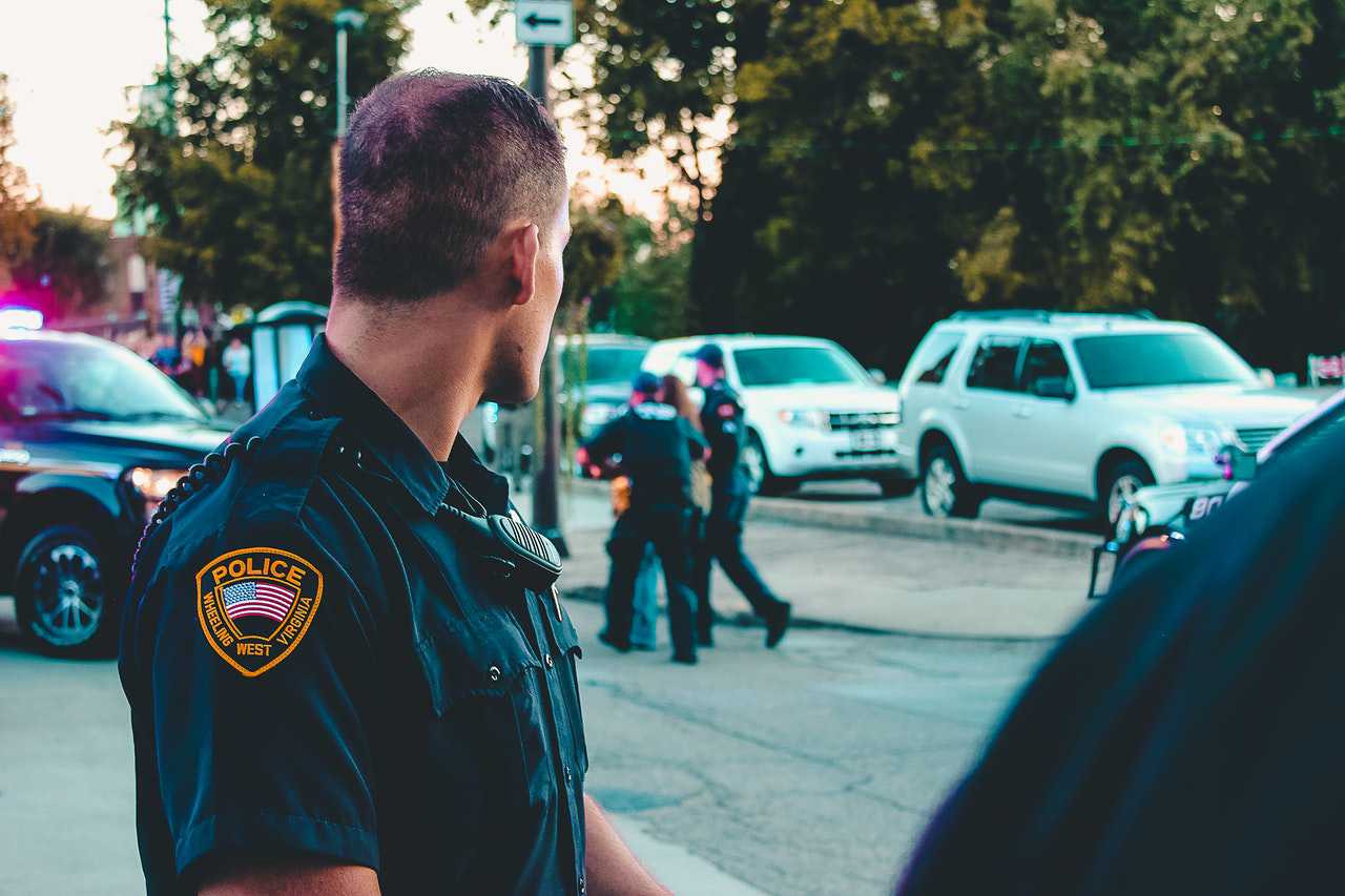 Man Wearing Black Officer Uniform | Veteran Car Donations