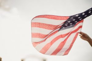 Waving the US Flag | Veteran Car Donations
