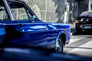 Parked Blue Car on a Street | Veteran Car Donations
