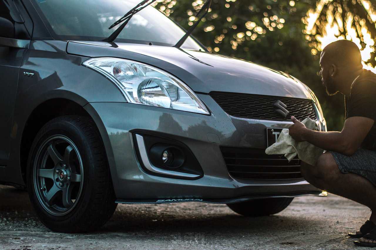 Person Cleaning Car | Veteran Car Donations
