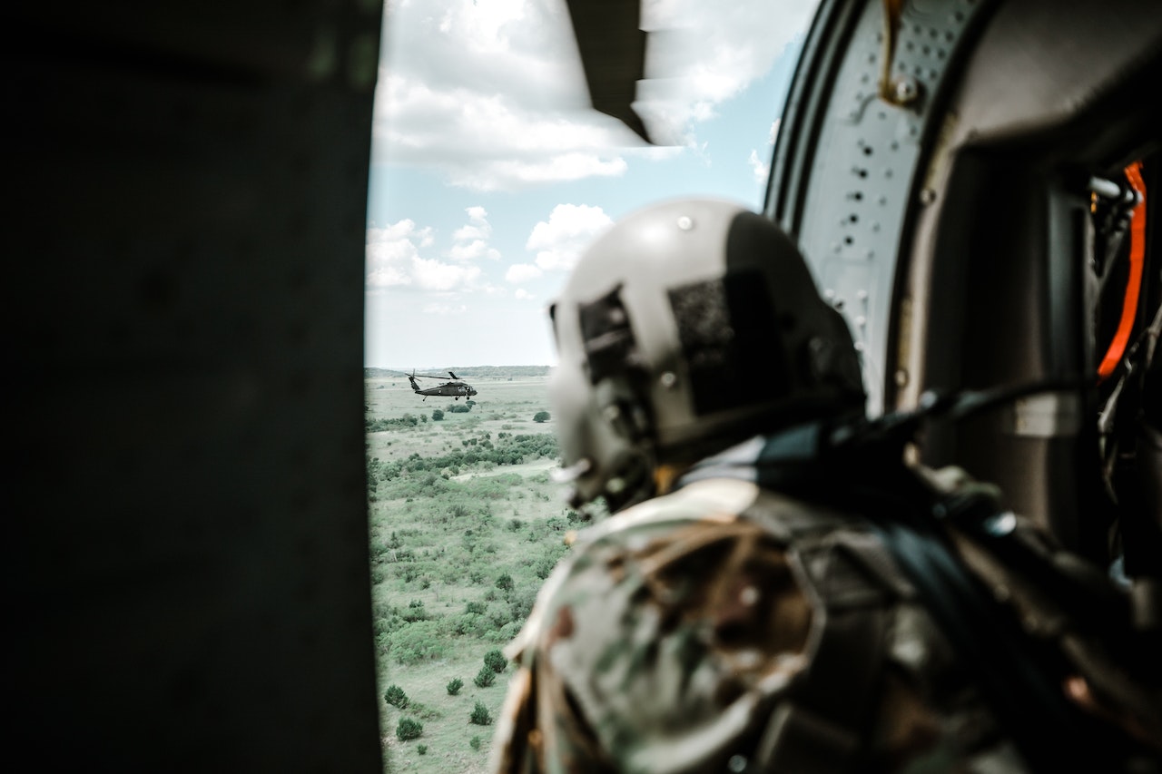 Soldier inside a Helicopter | Veteran Car Donations