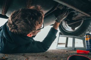 Man Fixing Vehicle | Veteran Car Donations