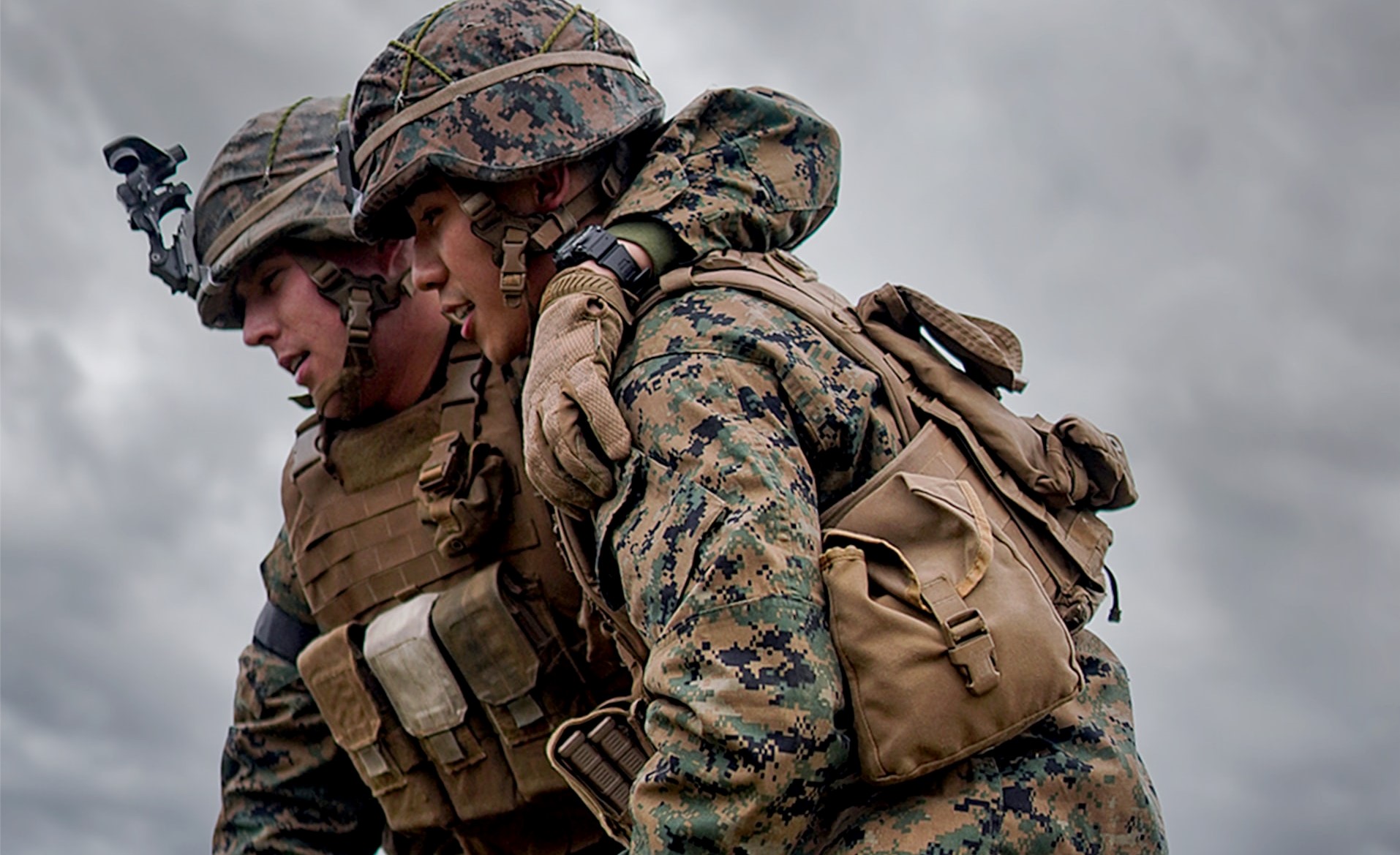 Two 2nd Lieutenants at The Basic School, Camp Barrett, practice an ambulatory carry during a Tactical Combat Casualty Care Excersize. | Veteran Car Donations