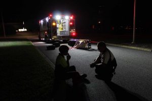 Paramedic Helping a Person | Veteran Car Donations