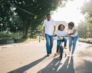 Parents Teaches Kid How to Ride a Bike | Veteran Car Donations