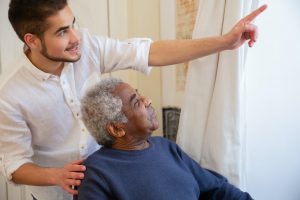 Caregiver Giving Care on a Nursing Home | Veteran Car Donations