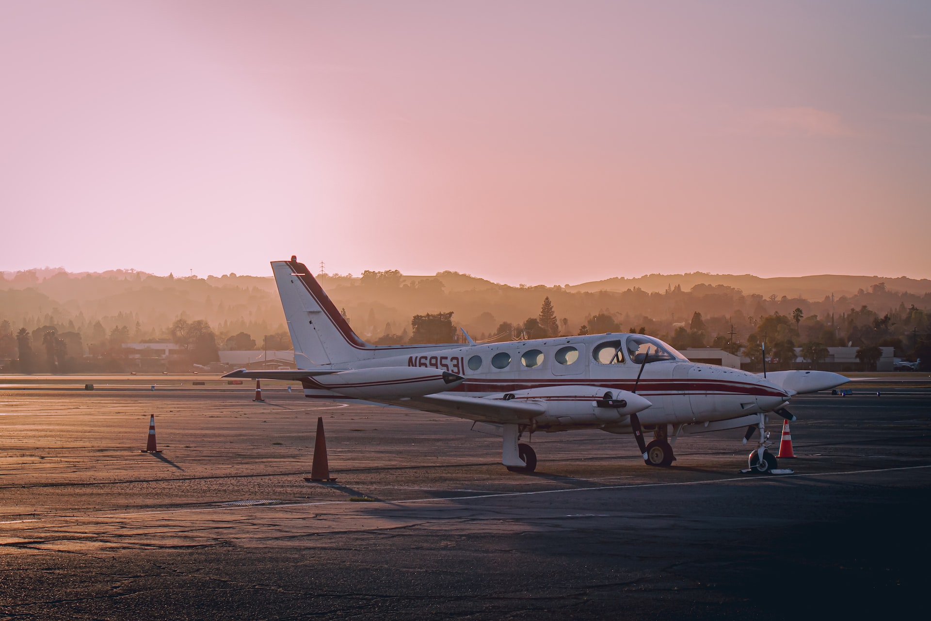 white and blue airplane on brown field during daytime | Veteran Car Donations