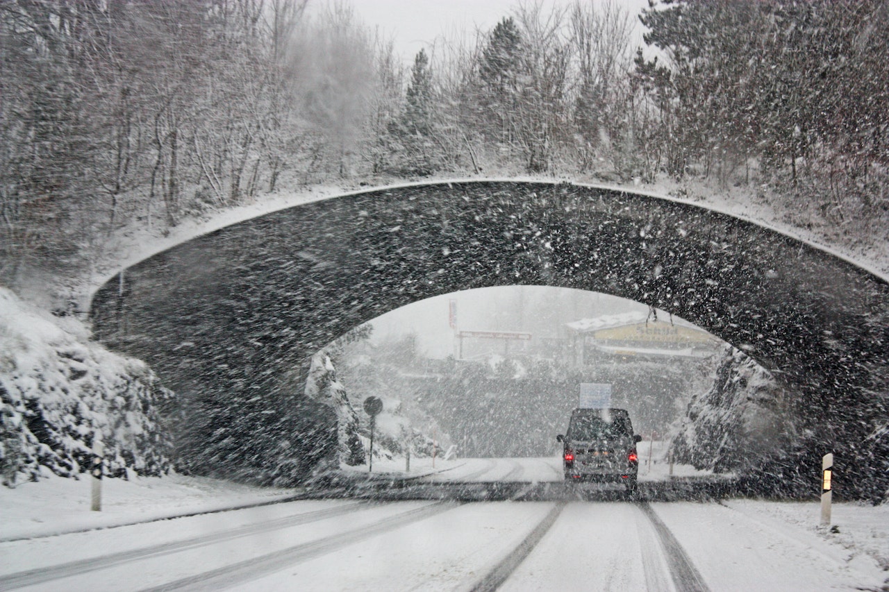 Photo of White Vehicle Crossing a Tunnel | Veteran Car Donations