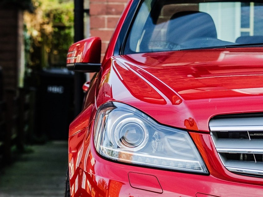 Parked Red Car | Veteran Car Donations
