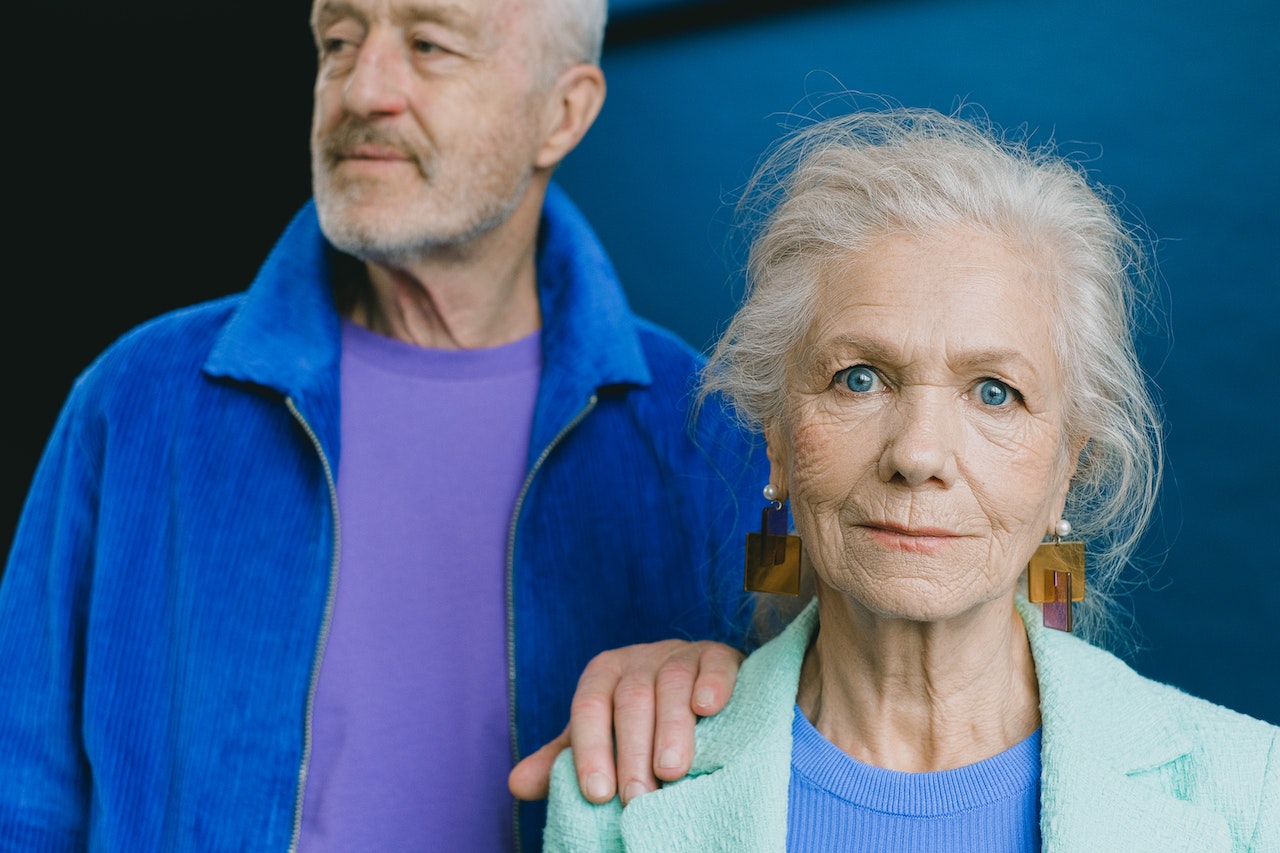 Woman Holding on a Woman's Shoulder | Veteran Car Donations
