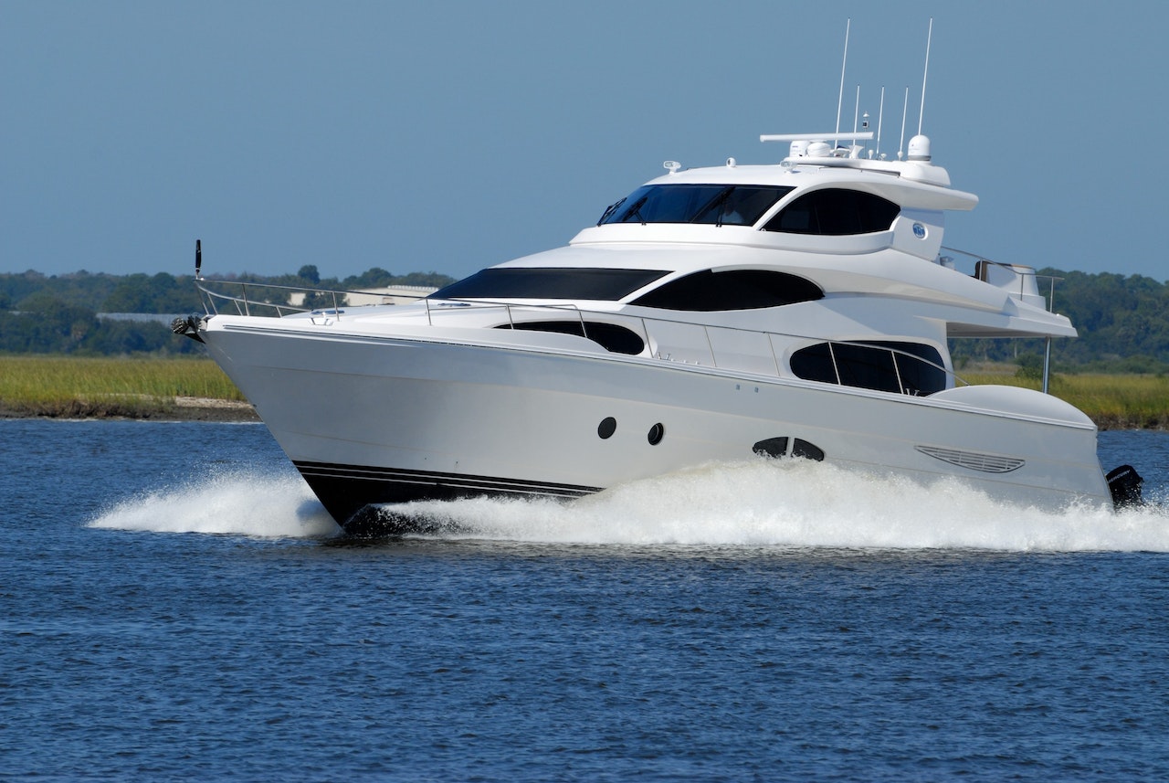 White Yacht on Running on Blue Body of Water during Daytime | Veteran Car Donations