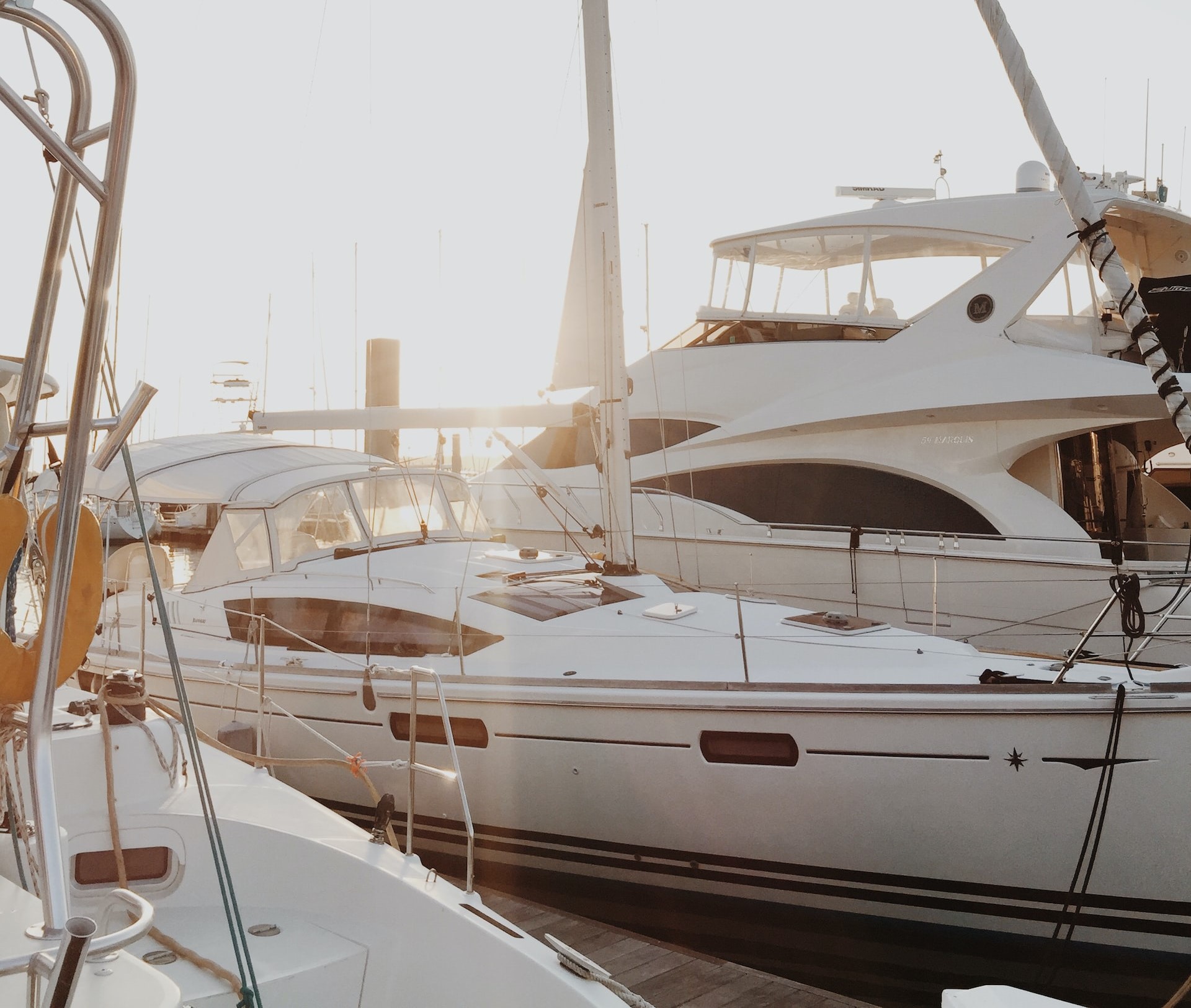 white yacht on dock during daytime | Veteran Car Donations