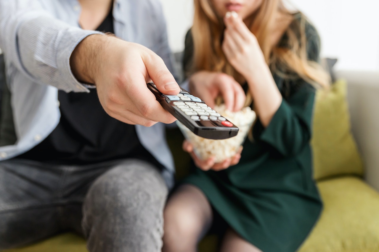 Man Holding Remote Control | Veteran Car Donations
