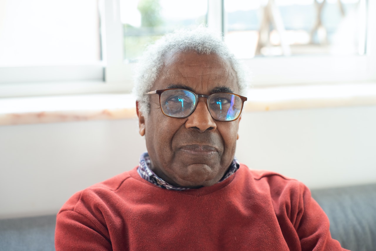 Close-Up Photograph of an Elderly Man with Gray Hair | Veteran Car Donations
