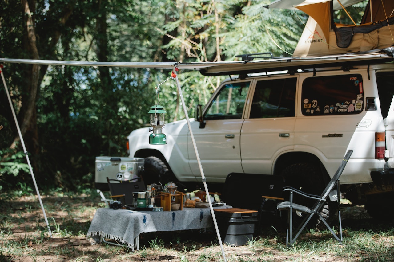 White Car with Tent | Veteran Car Donations