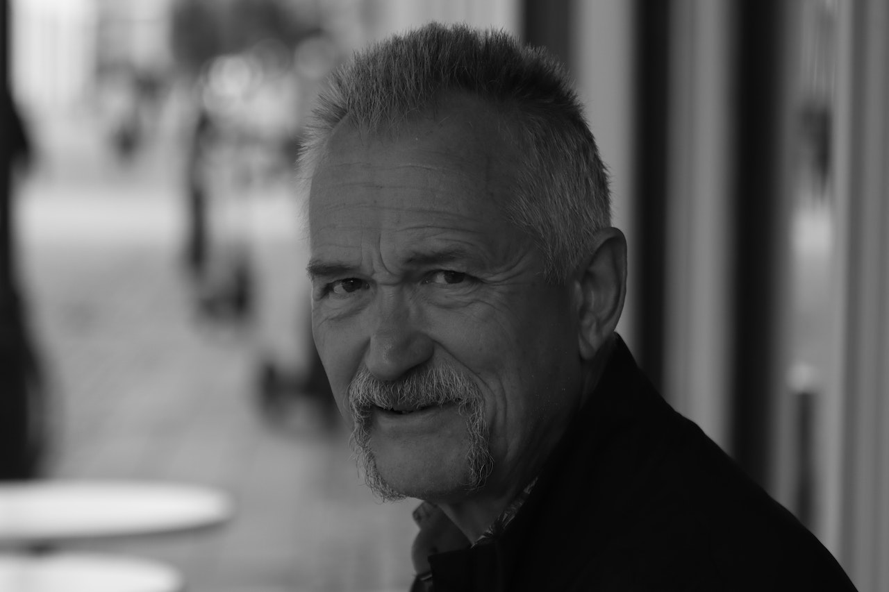 Grayscale Portrait of a Man With a Goatee | Veteran Car Donations
