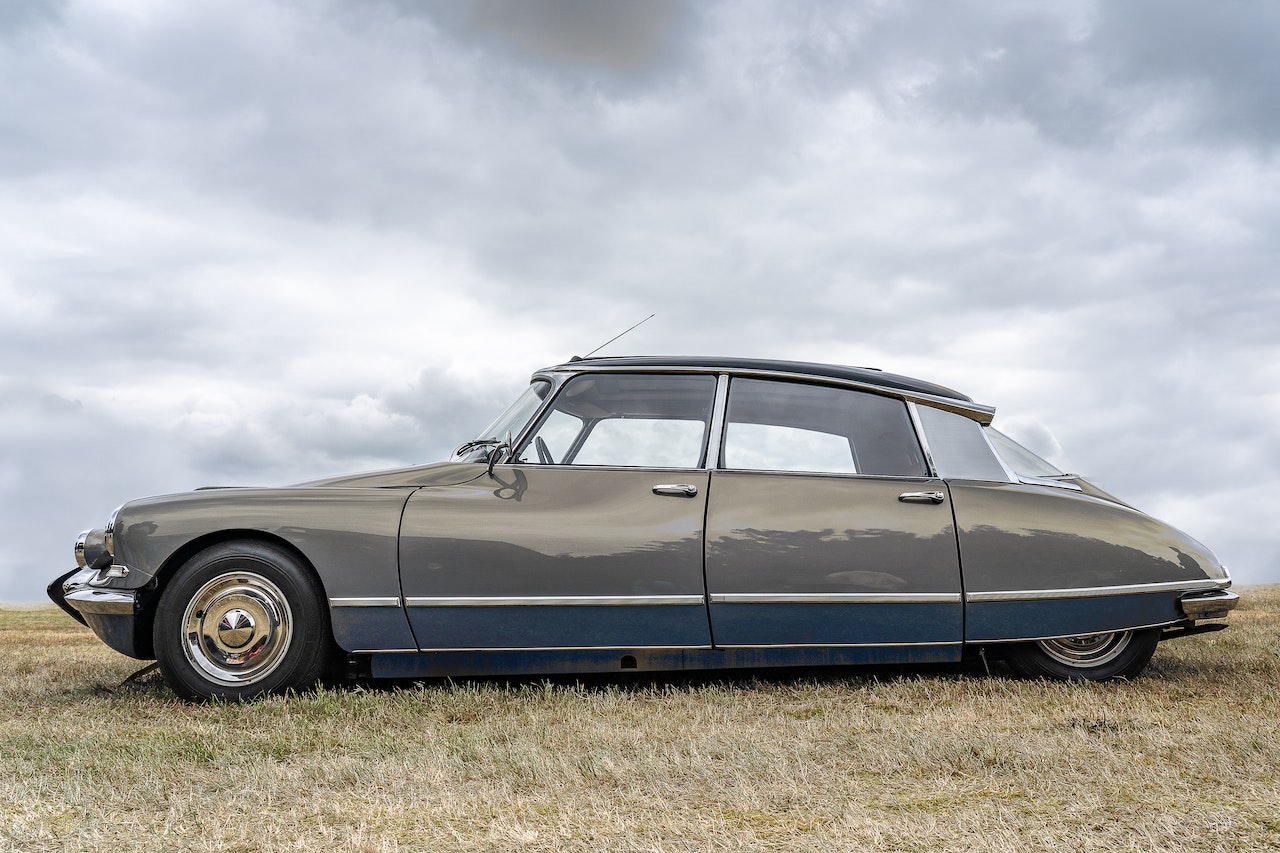 Car parked on green field | Veteran Car Donations