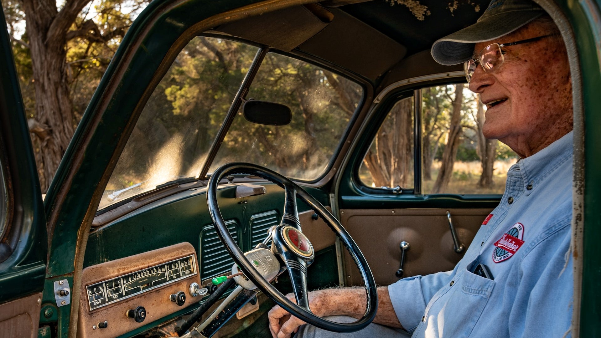 Old man in an old 1949 Studebaker pickup truck | Veteran Car Donations
