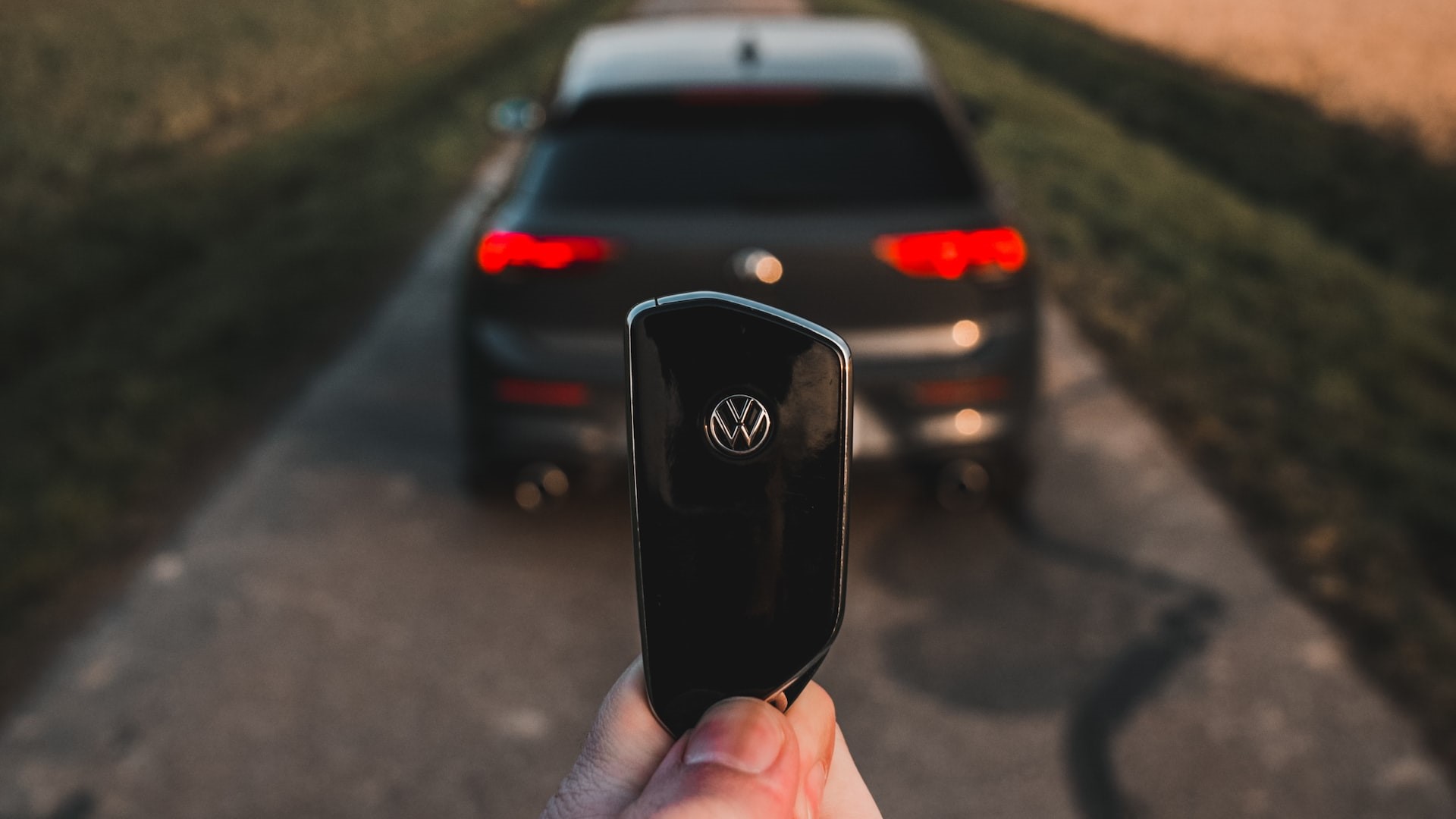 Person Holding Car Key | Veteran Car Donations
