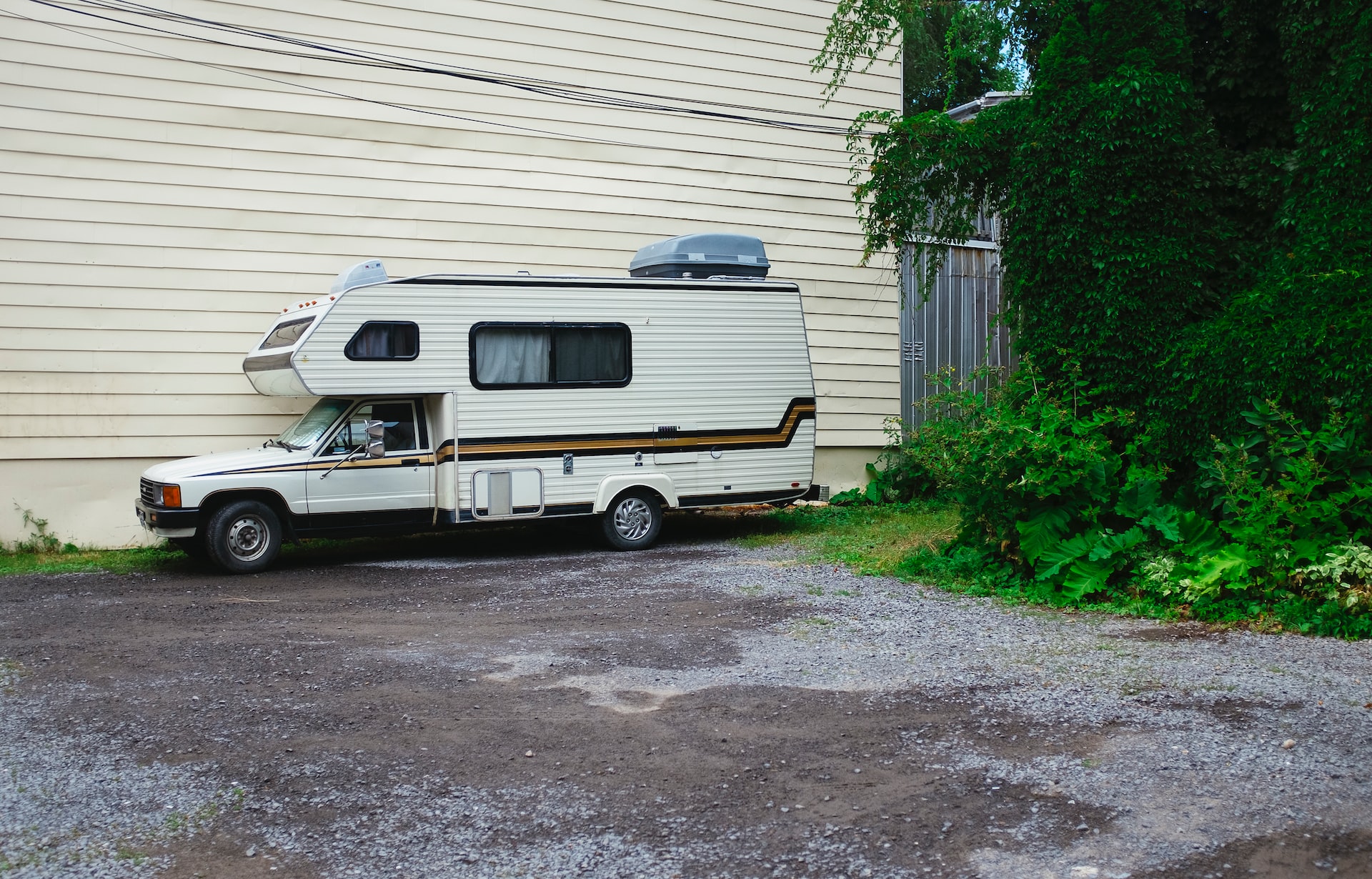 RV parked near a building | Veteran Car Donations