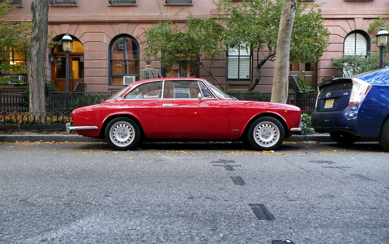 Red Classic Coupe car parked | Veteran Car Donations