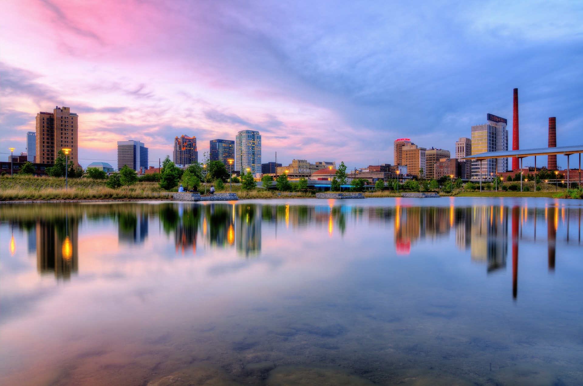 Reflection of Buildings in the River | Veteran Car Donations