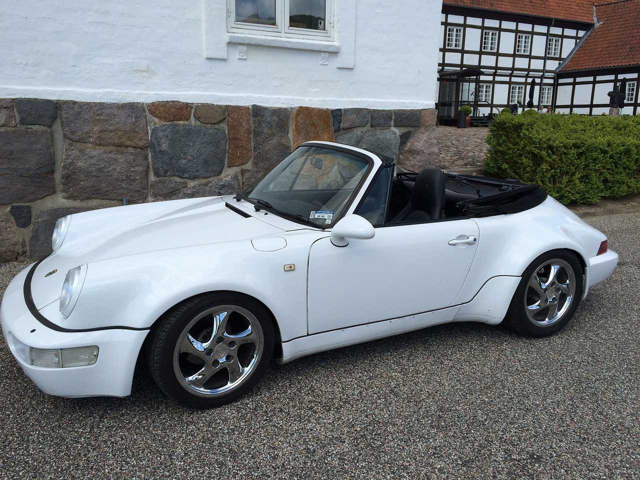 White Porsche Parked Outside | Veteran Car Donations
