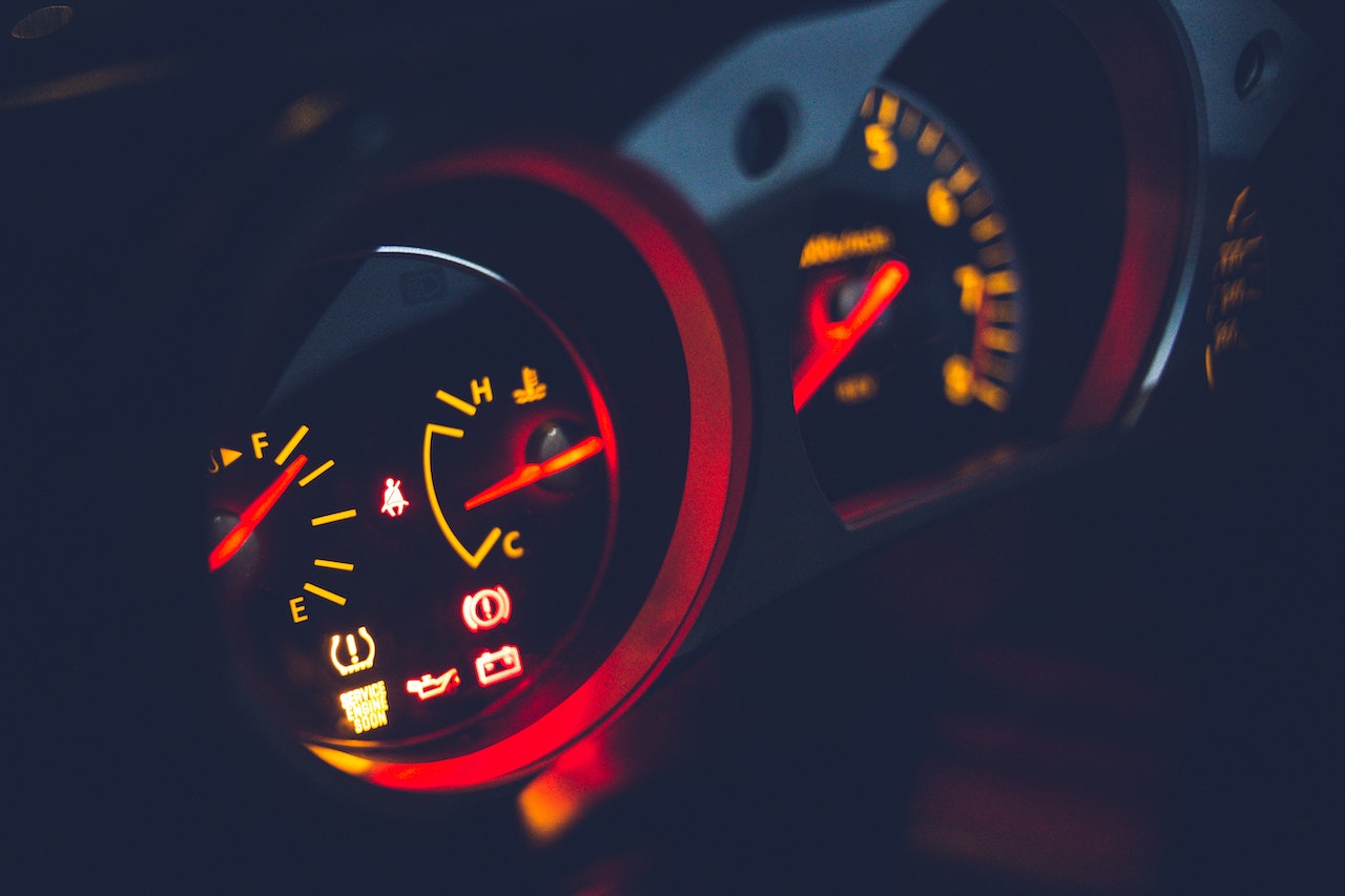 Fuel gauge on dashboard in contemporary automobile | Veteran Car Donations
